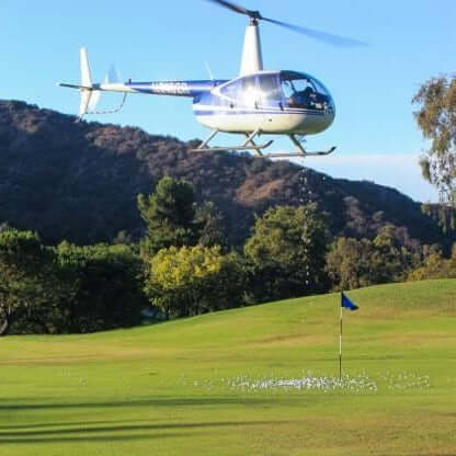 Robinson R44 Helicopter Drops Golf Balls at Fundraiser