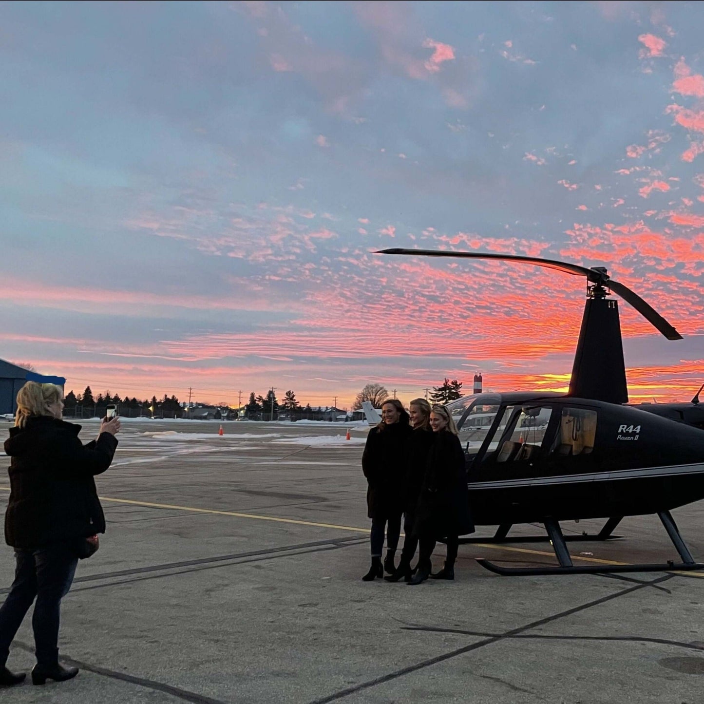 People Pose for Helicopter Photo Opportunity in Columbus Ohio