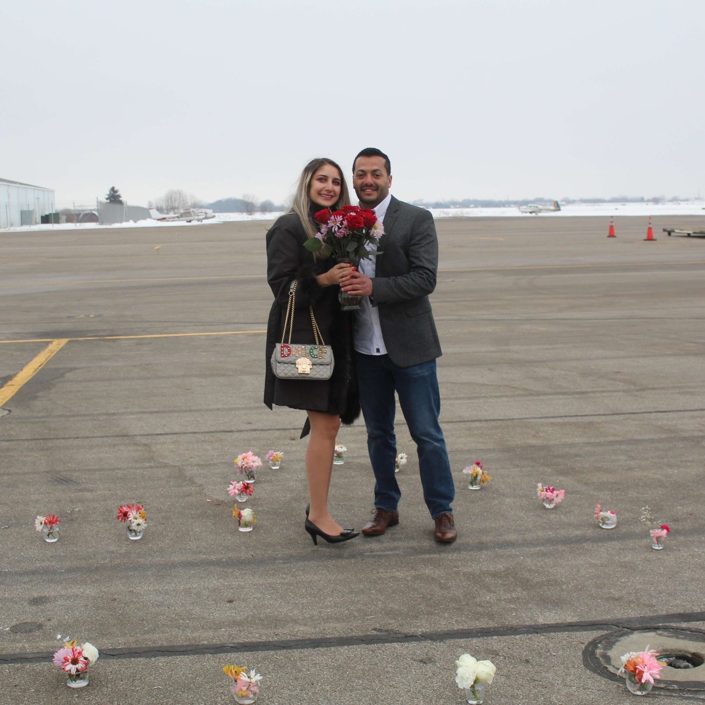 Wedding Couple Pose after Helicopter Proposal Flight